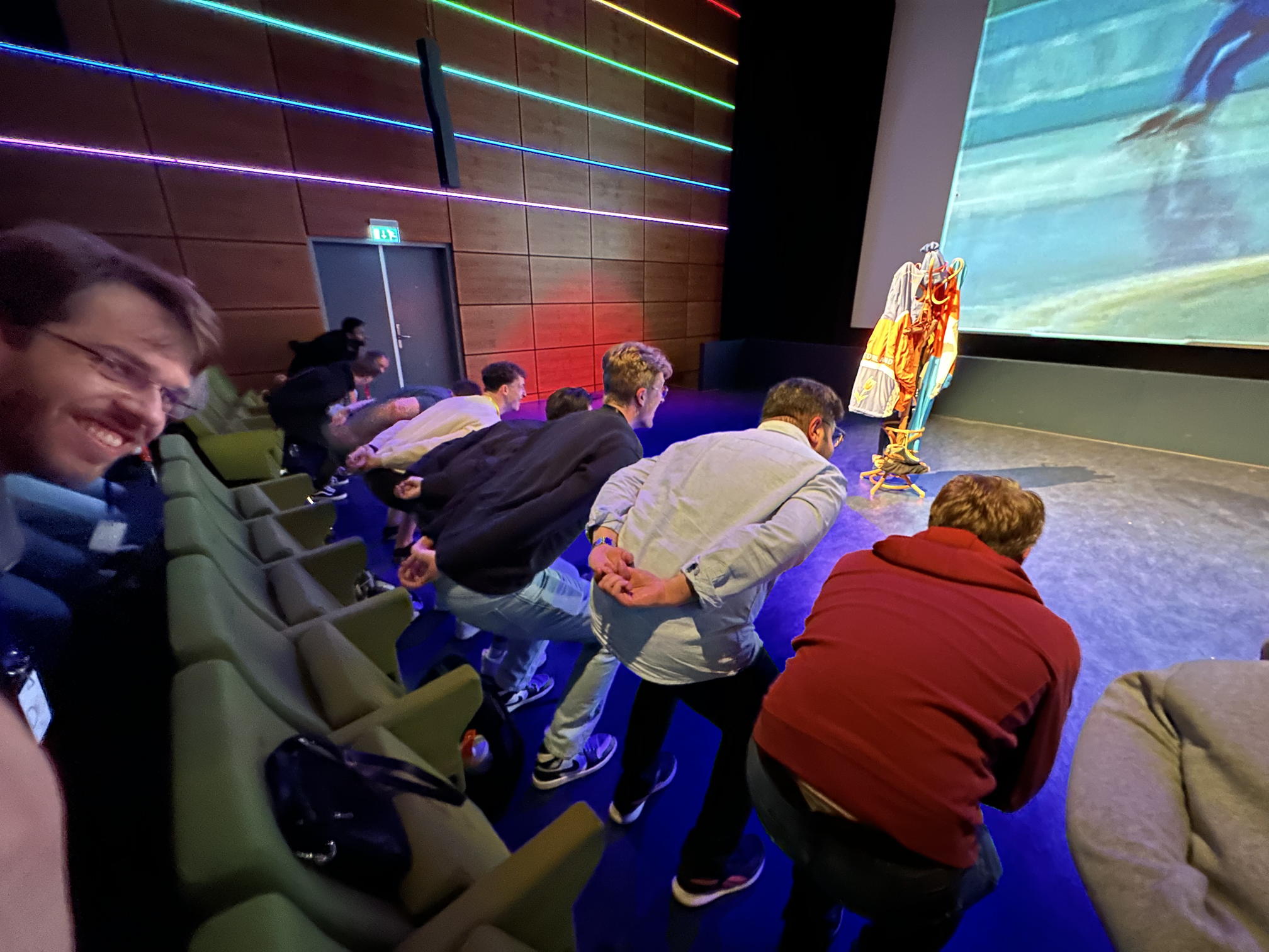 audience in ice-skating position